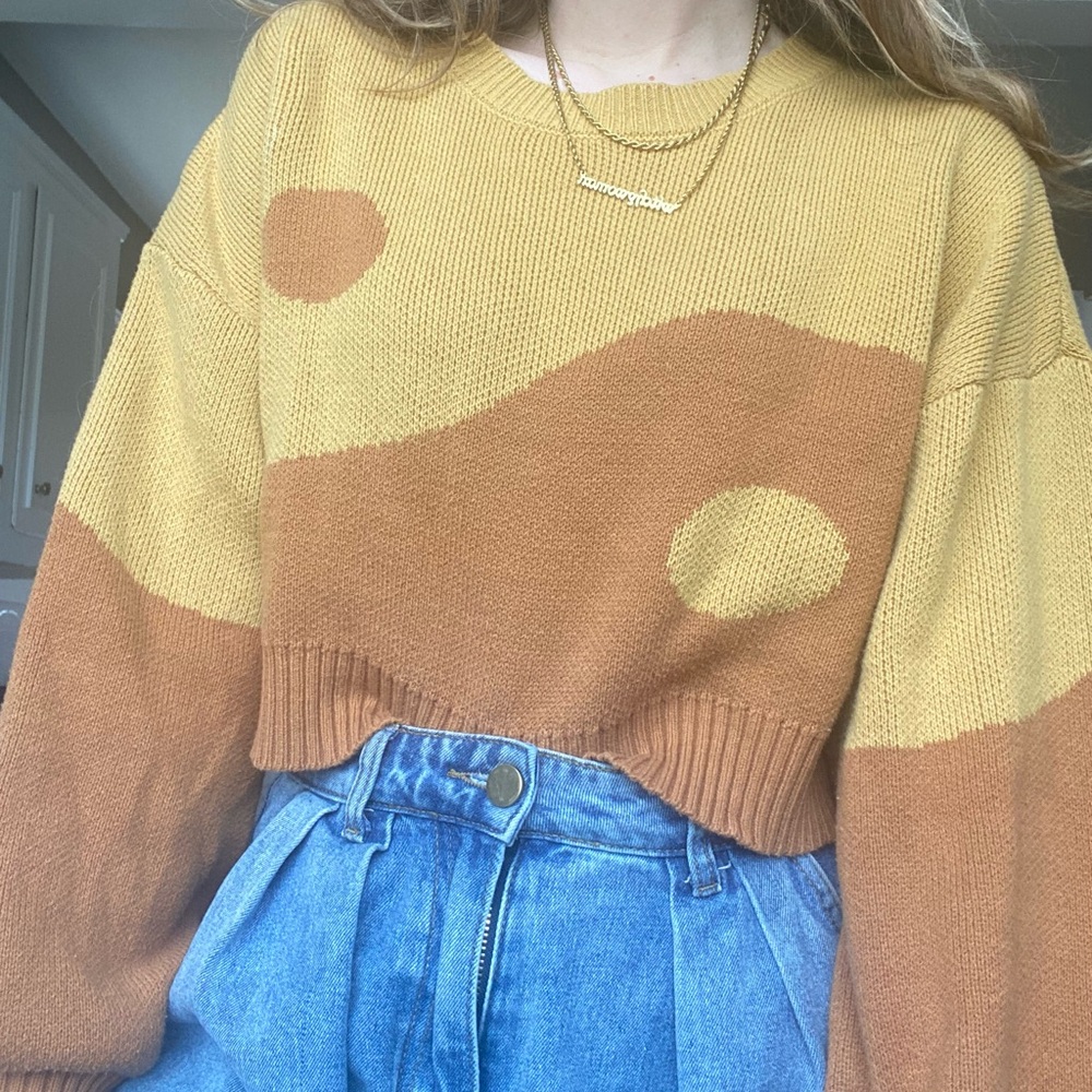 Cropped yin yang sweater